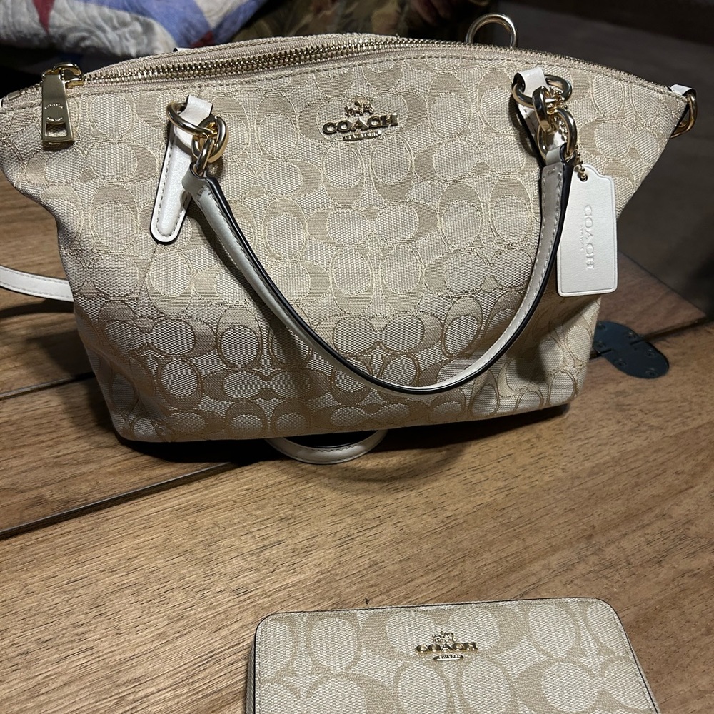 Cream colored Coach purse.  New without tags.